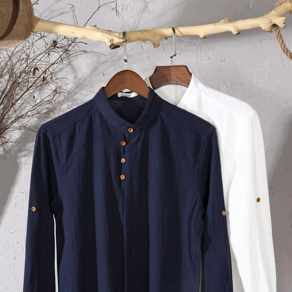 Stylish men's long sleeve button-up shirt with a distinctive stand collar, ideal for versatile everyday men's fashion.