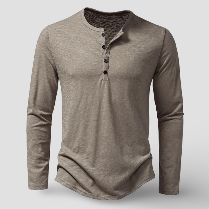 Versatile men's long sleeve henley top in a comfortable fabric, ideal for everyday casual fashion. Essential wardrobe piece.