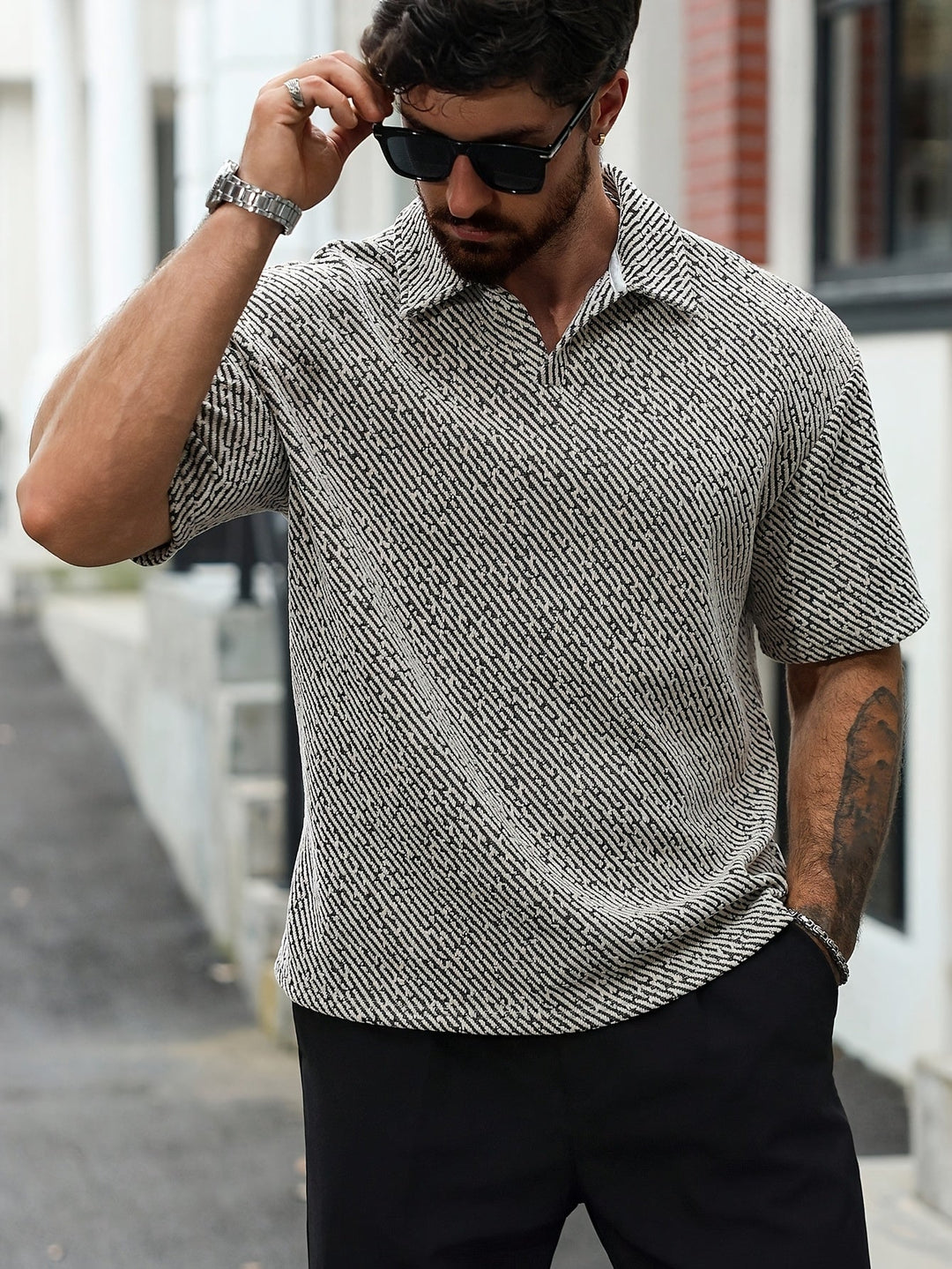 Casual men's textured Monaco polo shirt, oversized fit, short sleeve, breathable for warm weather summer outings.