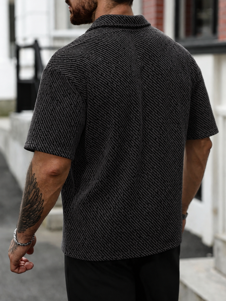 Fashionable men's Monaco polo shirt, textured, short sleeve, oversized fit, ideal casual summer top for men.