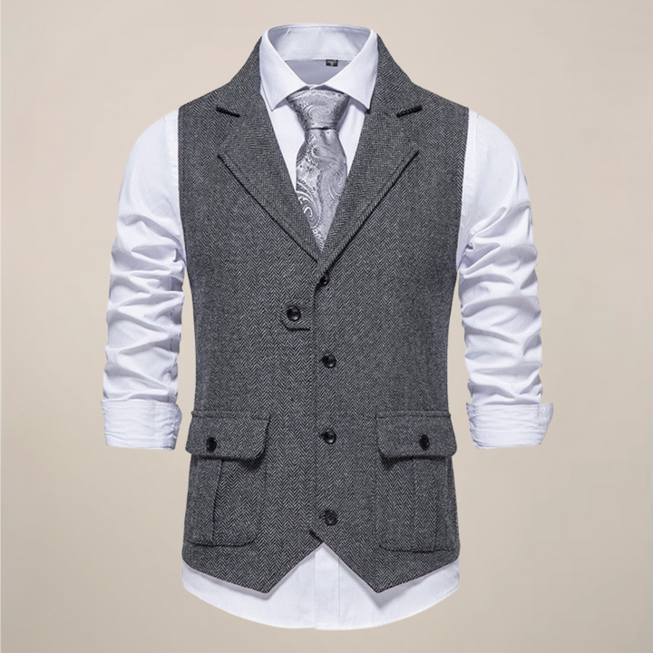Detail shot of a men's notch lapel waistcoat, showcasing quality fabric, buttons & elegant stitching.