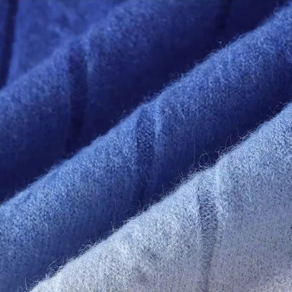 Fashionable men's pullover sweater featuring a unique blue-to-black ombre gradient design for stylish wear.