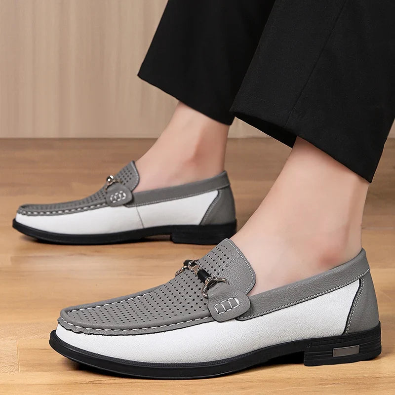 Trendy men's perforated slip-on loafers, perfect for adding a stylish touch to casual looks.