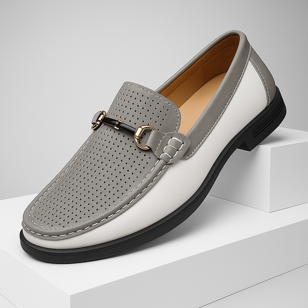 Modern men's perforated leather loafers with a classic bit detail; perfect casual footwear.
