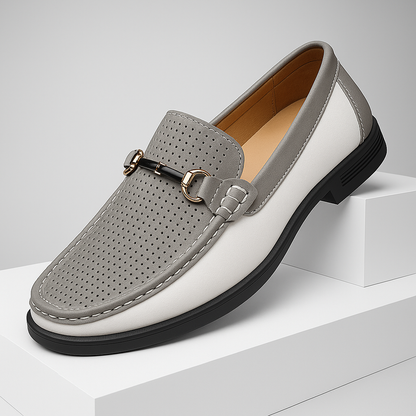 Modern men's perforated leather loafers with a classic bit detail; perfect casual footwear.