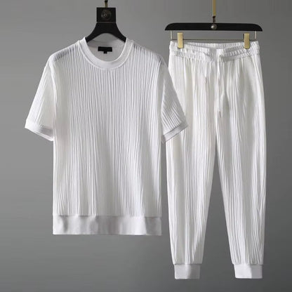 Stylish men's pleated two-piece lounge set, relaxed fit for comfortable casual wear & modern off-duty look.