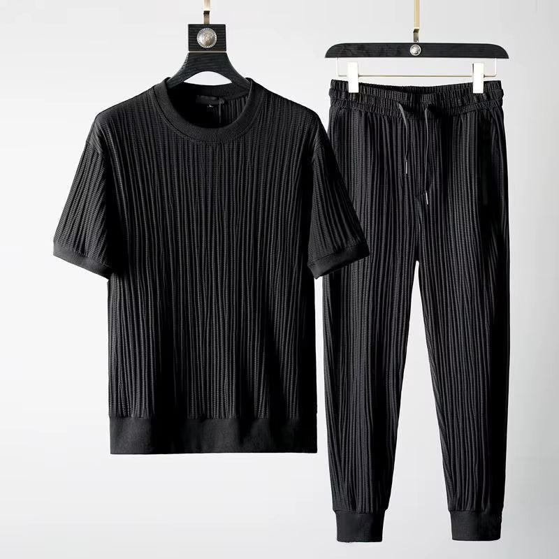 Men's ultimate comfort pleated lounge set. Relaxed fit two-piece casual apparel for off-duty style.