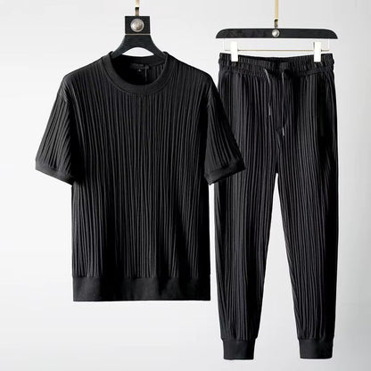 Men's ultimate comfort pleated lounge set. Relaxed fit two-piece casual apparel for off-duty style.