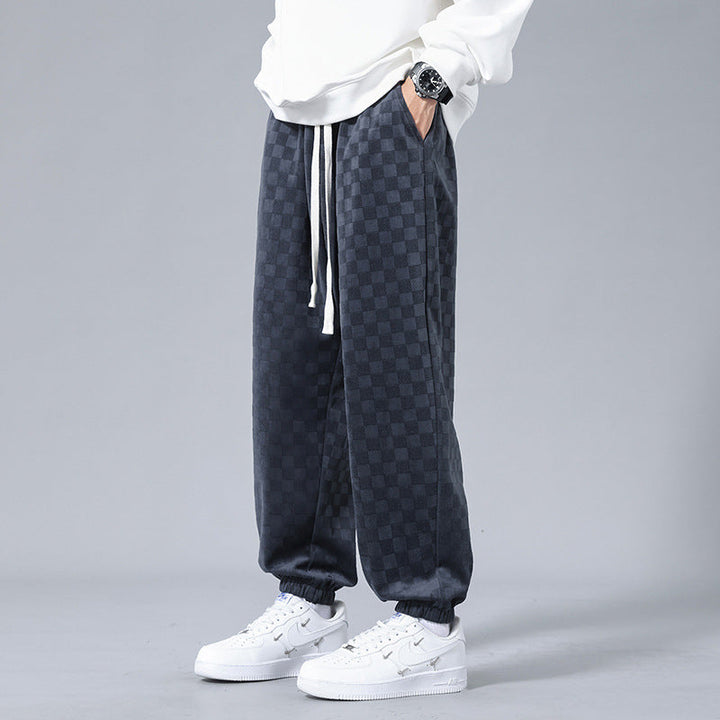 Men's stylish relaxed-fit checkerboard sweatpants, perfect for casual comfort & streetwear fashion.