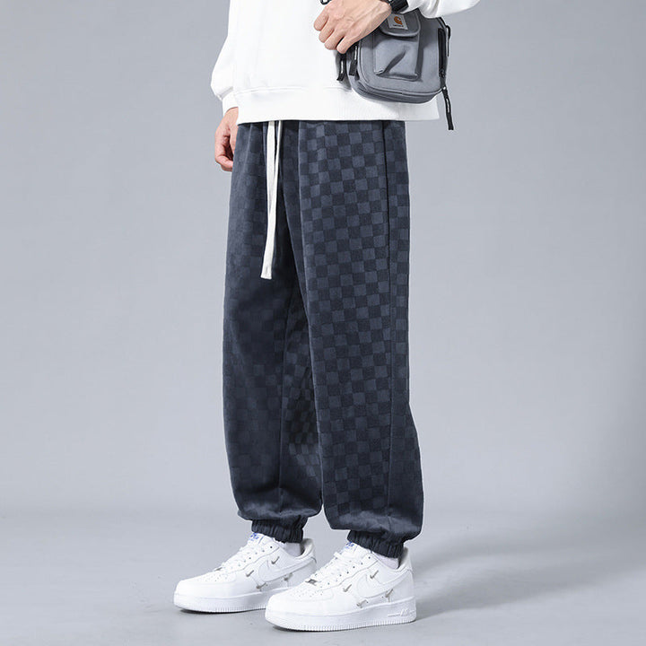 Relaxed-fit men's checkerboard joggers, combining style with ultimate casual comfort for everyday wear.
