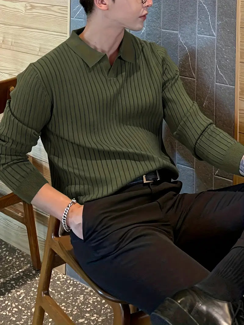 Overhead shot of a folded men's stylish ribbed knit polo shirt, showcasing texture & color.