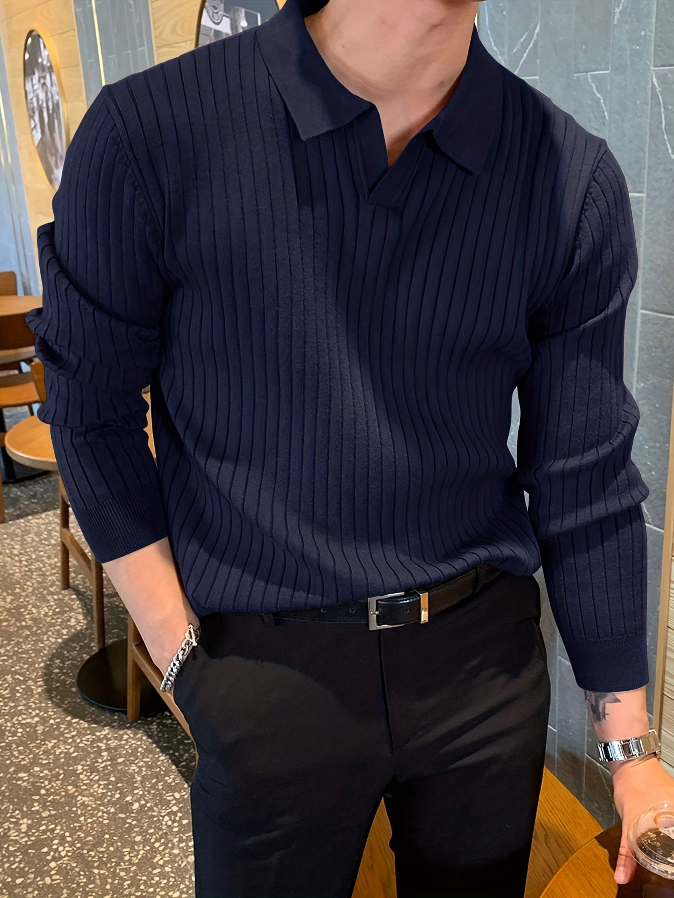 Full view: men's stylish ribbed knit polo shirt, highlighting its comfortable fit & modern design.