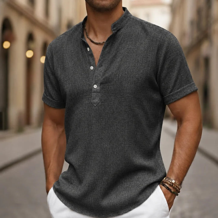 Relaxed fit men's Henley polo shirt, a stylish and comfortable choice for casual summer outfits.