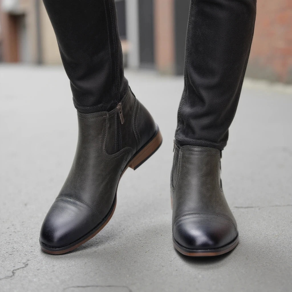 Brown leather men's slip-on Chelsea boots, perfect for a refined yet casual look.