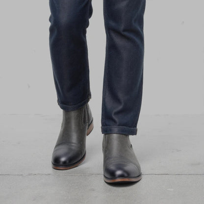 Sleek men's slip-on dress boots: Chelsea style with a practical side zipper.
