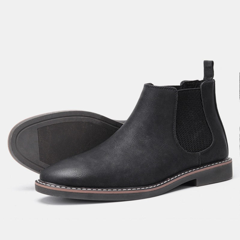 Full view of men's slip-on Chelsea boots, styled for a sleek, comfortable, and fashionable everyday look.