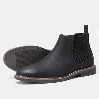 Full view of men's slip-on Chelsea boots, styled for a sleek, comfortable, and fashionable everyday look.