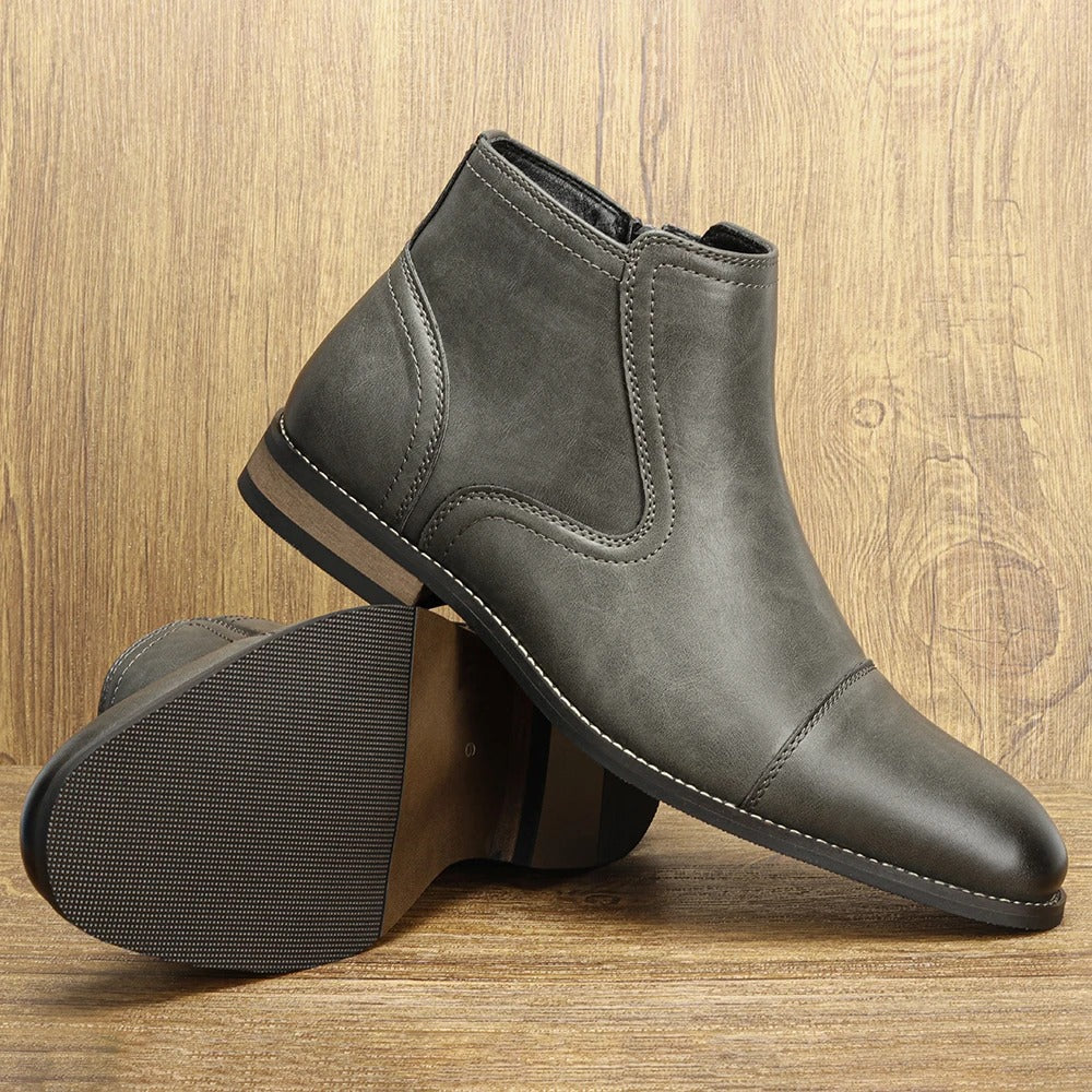 Tan leather men's slip-on Chelsea boots with cap toe & side zipper for versatile fashion.