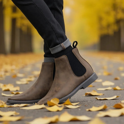 Fashionable men's Chelsea boots with easy slip-on style, providing sleek and comfortable everyday footwear.