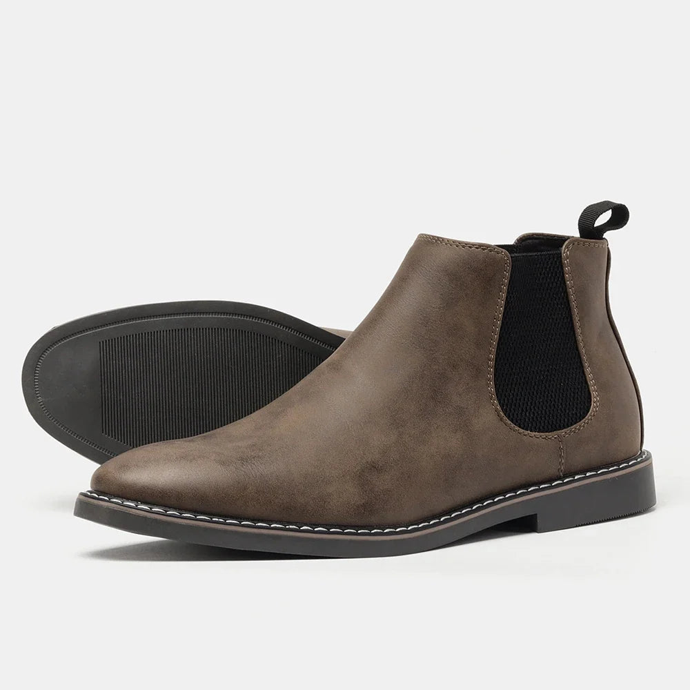 Classic men's slip-on Chelsea boots, featuring a timeless design for sophisticated and comfortable everyday wear.