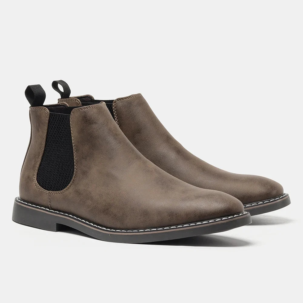 Stylish men's slip-on boots, convenient Chelsea design for quick and fashionable everyday looks.