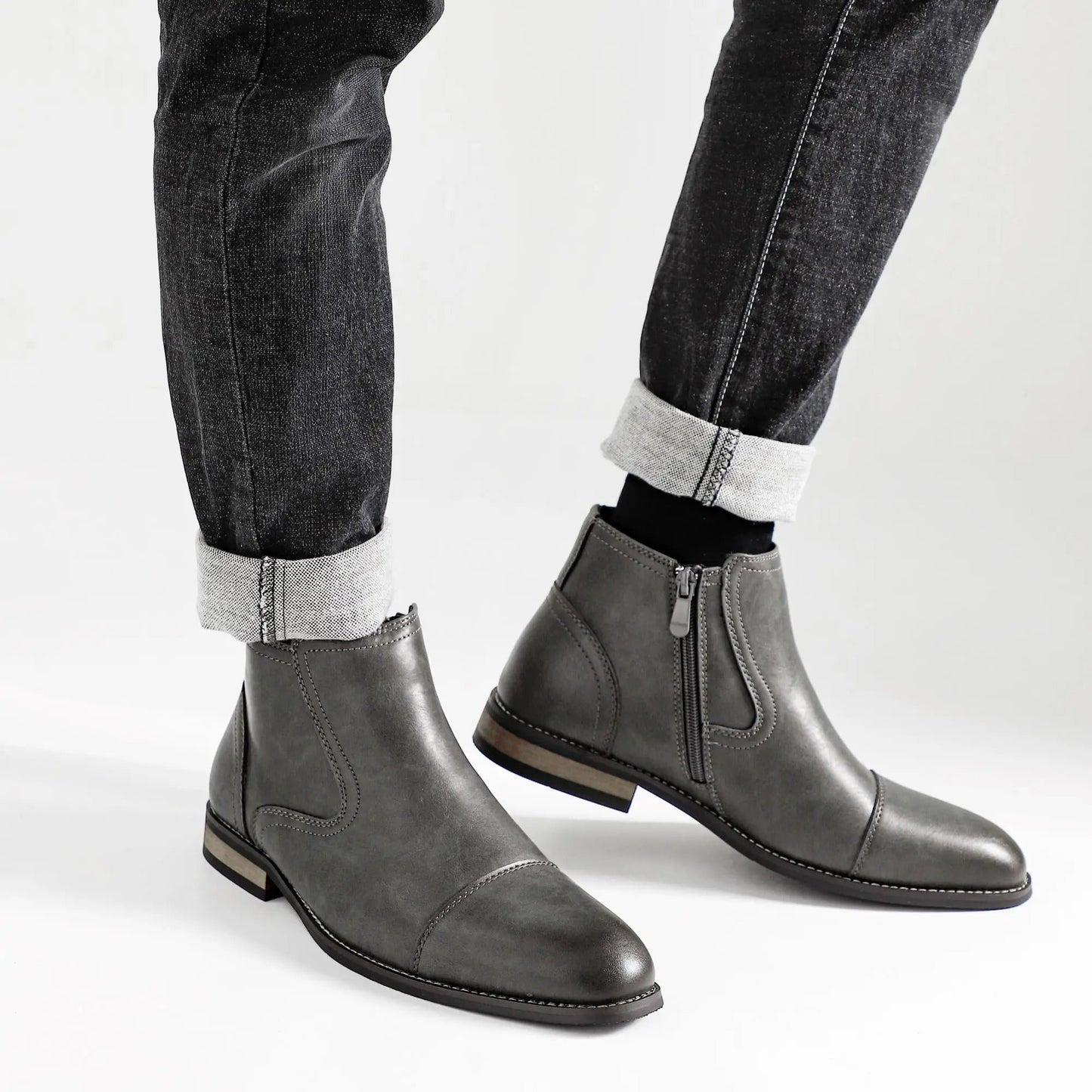 Versatile men's dress boots: stylish slip-on Chelsea with cap toe, perfect for any occasion.