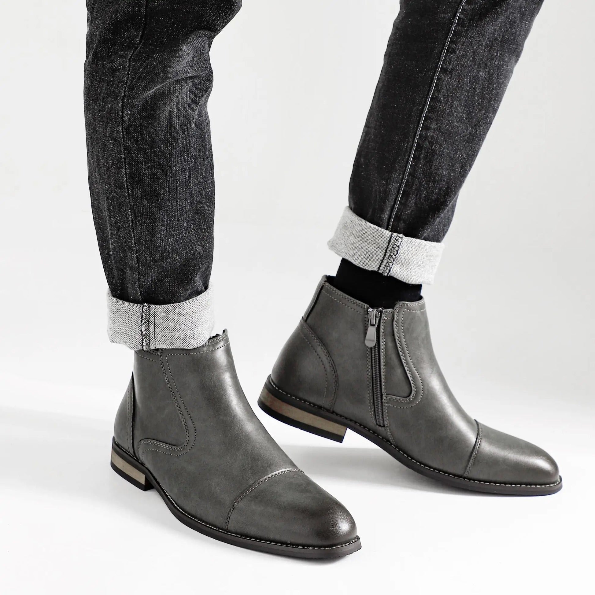 Versatile men's dress boots: stylish slip-on Chelsea with cap toe, perfect for any occasion.
