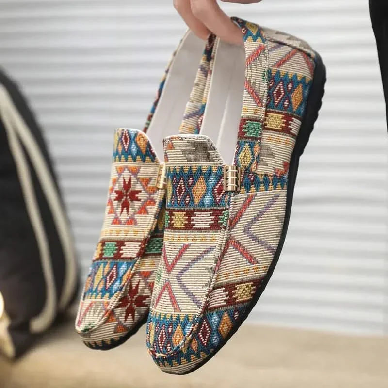 Men's stylish slip-on loafers featuring a vibrant Aztec design, perfect for casual summer wear.