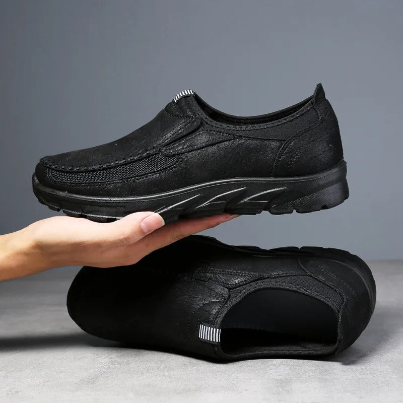 Durable men's slip-on loafers for everyday wear, offering comfort and style.