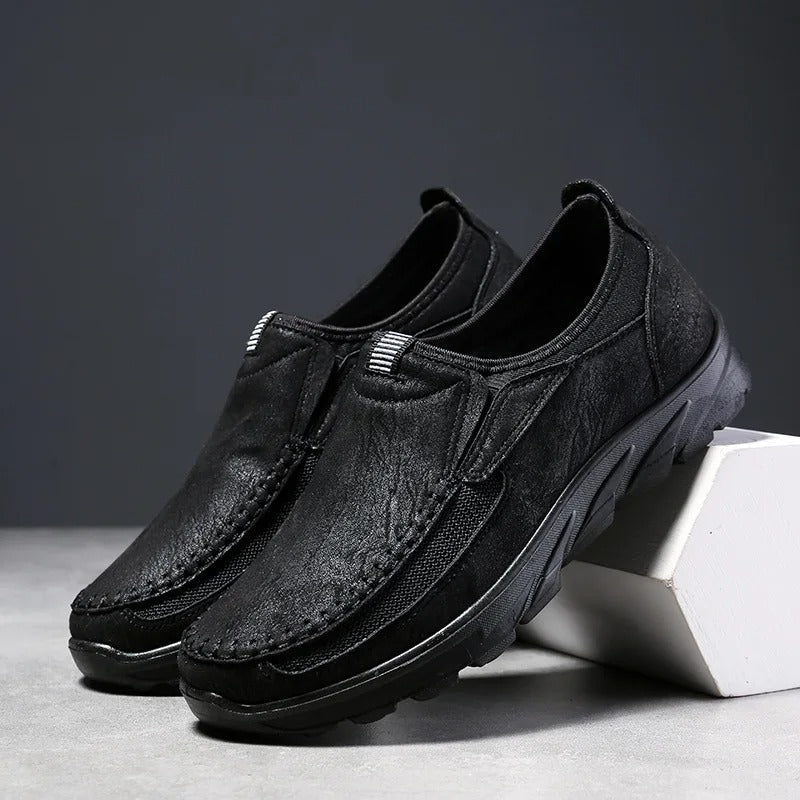 Lightweight men's slip-on loafers, comfortable and stylish for casual walking.