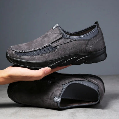 Close-up of comfortable men's slip-on loafers, featuring breathable fabric and durable design.