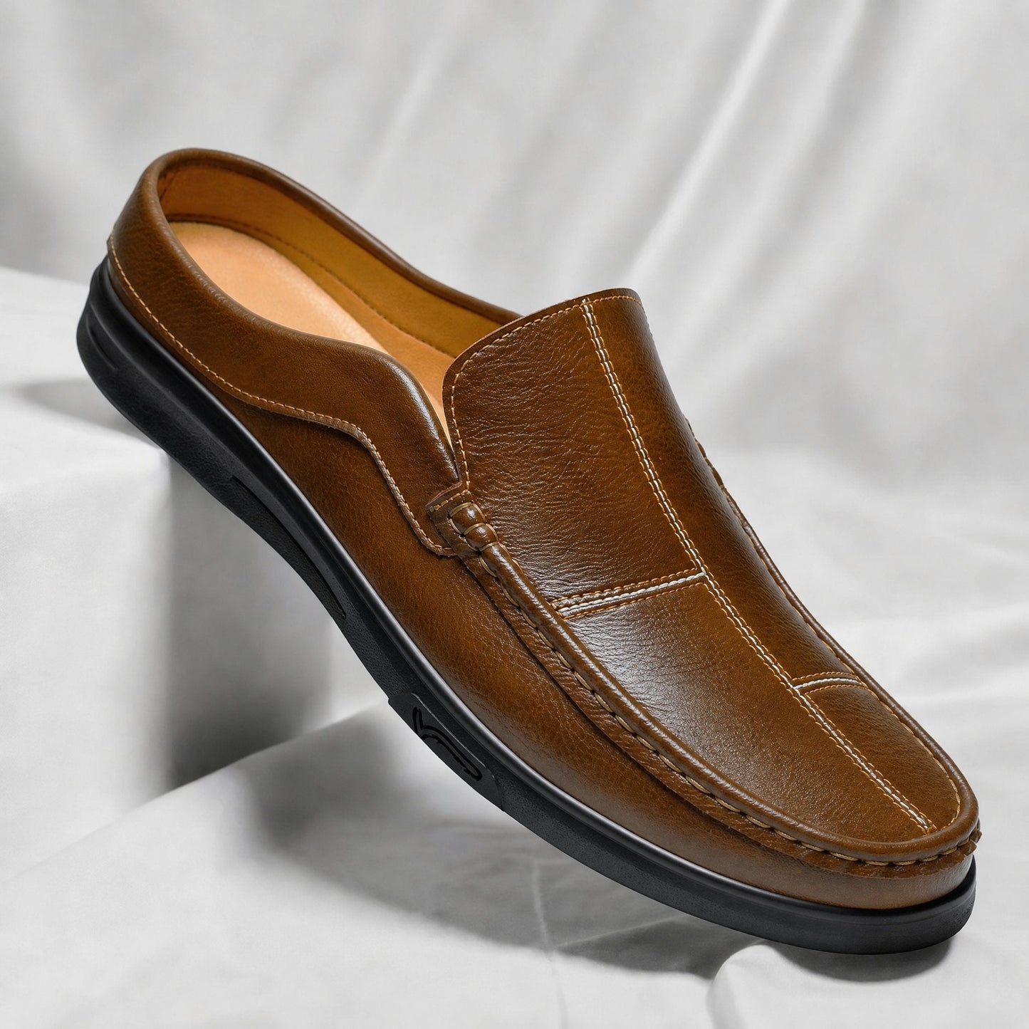 Men's stylish slip-on mules in a versatile design for all-day comfort and easy everyday wear.