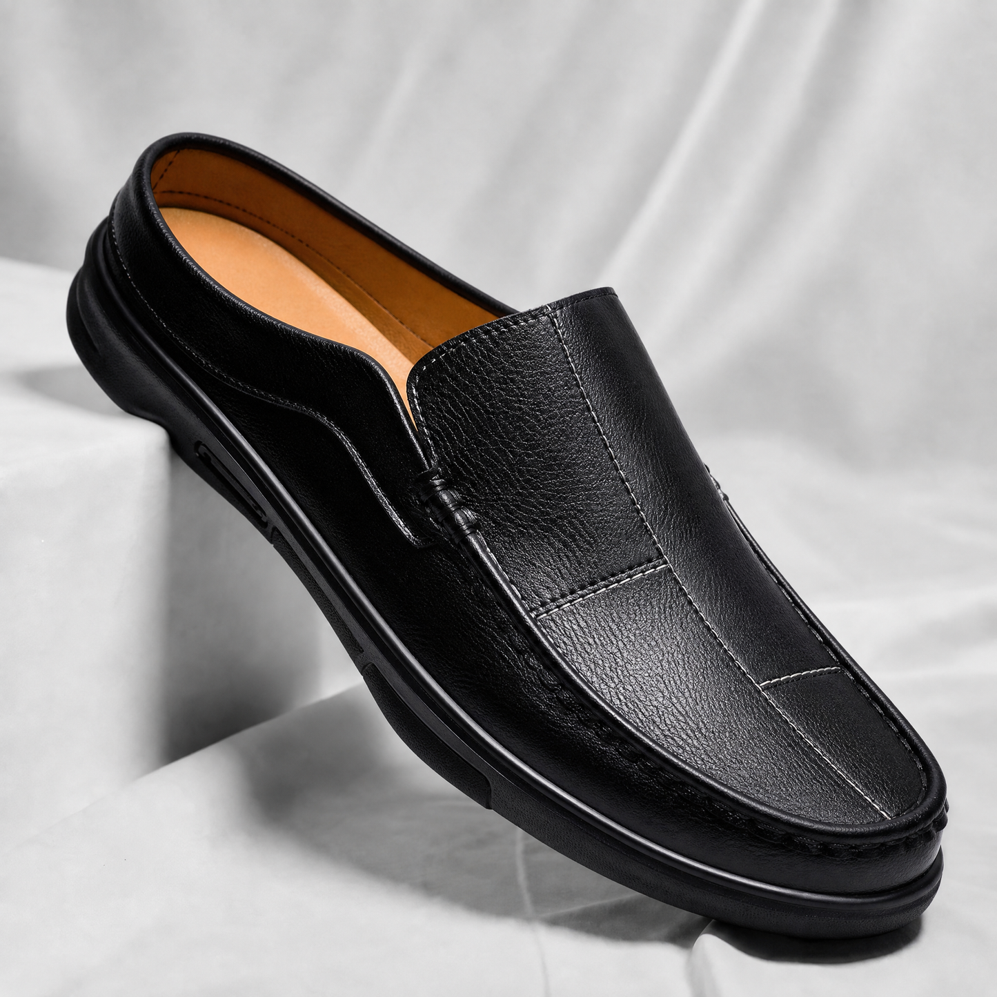 Fashionable men's slip-on mules, designed for style, comfort, and versatile everyday wear.