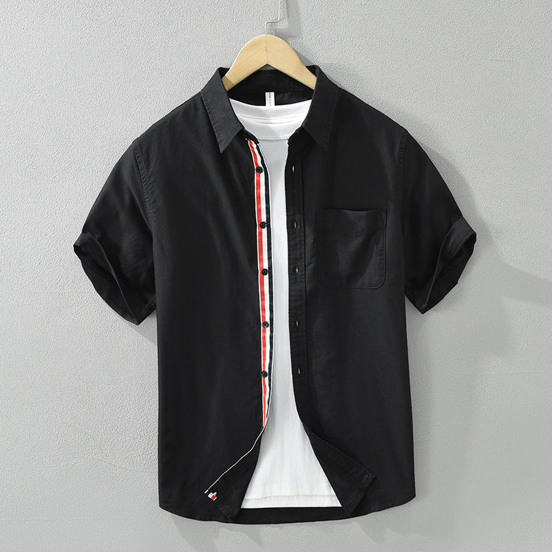 Breathable men's casual striped button-up shirt. Ideal lightweight short-sleeve summer wear for stylish comfort.