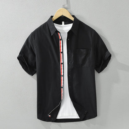 Breathable men's casual striped button-up shirt. Ideal lightweight short-sleeve summer wear for stylish comfort.
