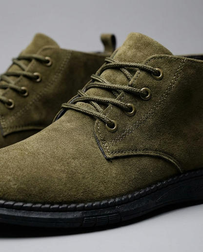 Black men's lace-up suede leather Roam boots, offering stylish comfort for daily and outdoor adventures.