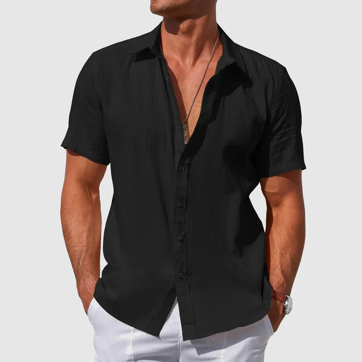Versatile men's short sleeve textured top, ideal for warm weather & everyday wear.