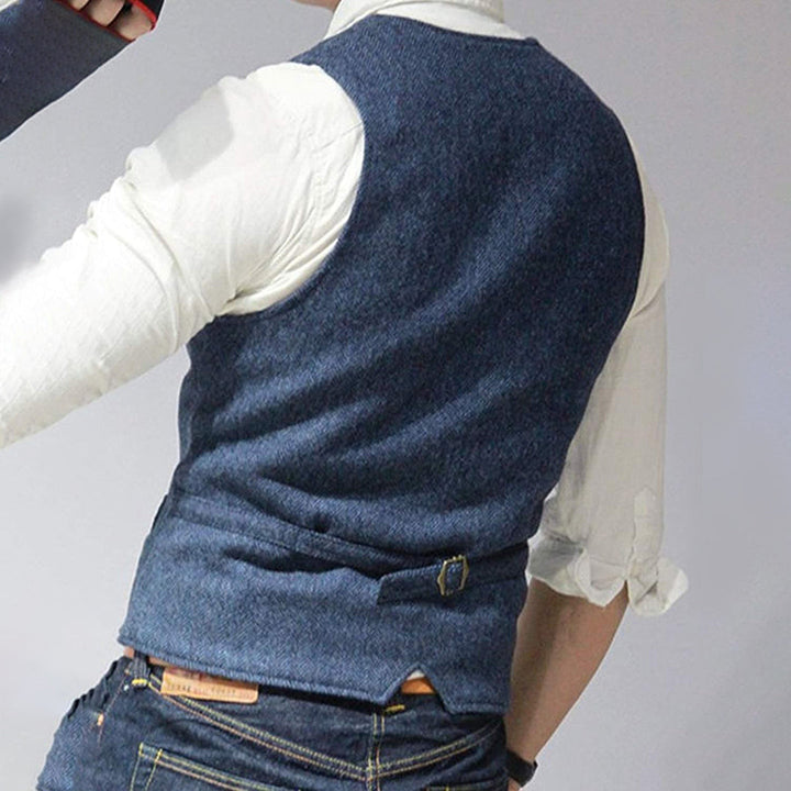 Tailored men's wool blend gilet vest, offering classic style and comfort for various occasions.