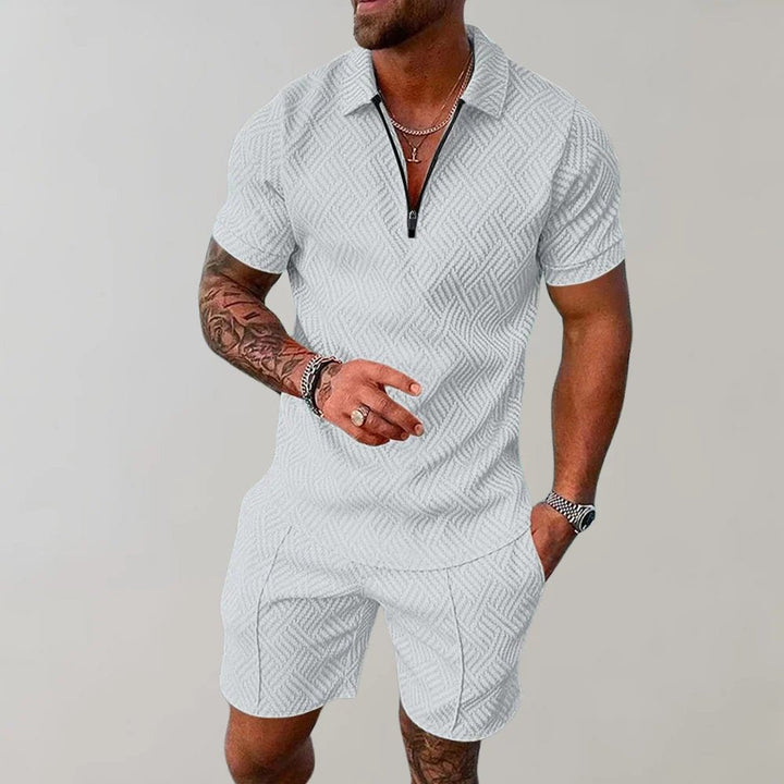 Men's modern two-piece zip polo short set. Stylish & comfortable summer outfit for casual wear or men's fashion.