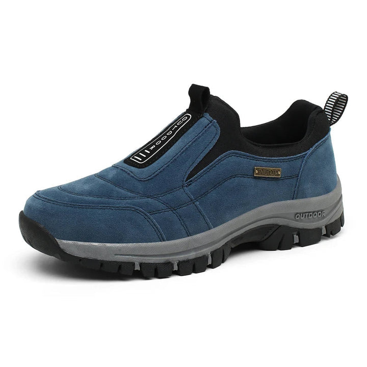 Close-up of men's supportive hiking shoes, showing robust design, ideal for outdoor trails & foot comfort.