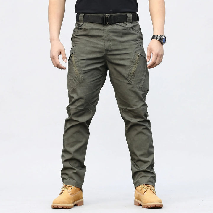 Weather-resistant men's tactical cargo pants with 9 pockets, providing comfort and durability for any outdoor challenge.