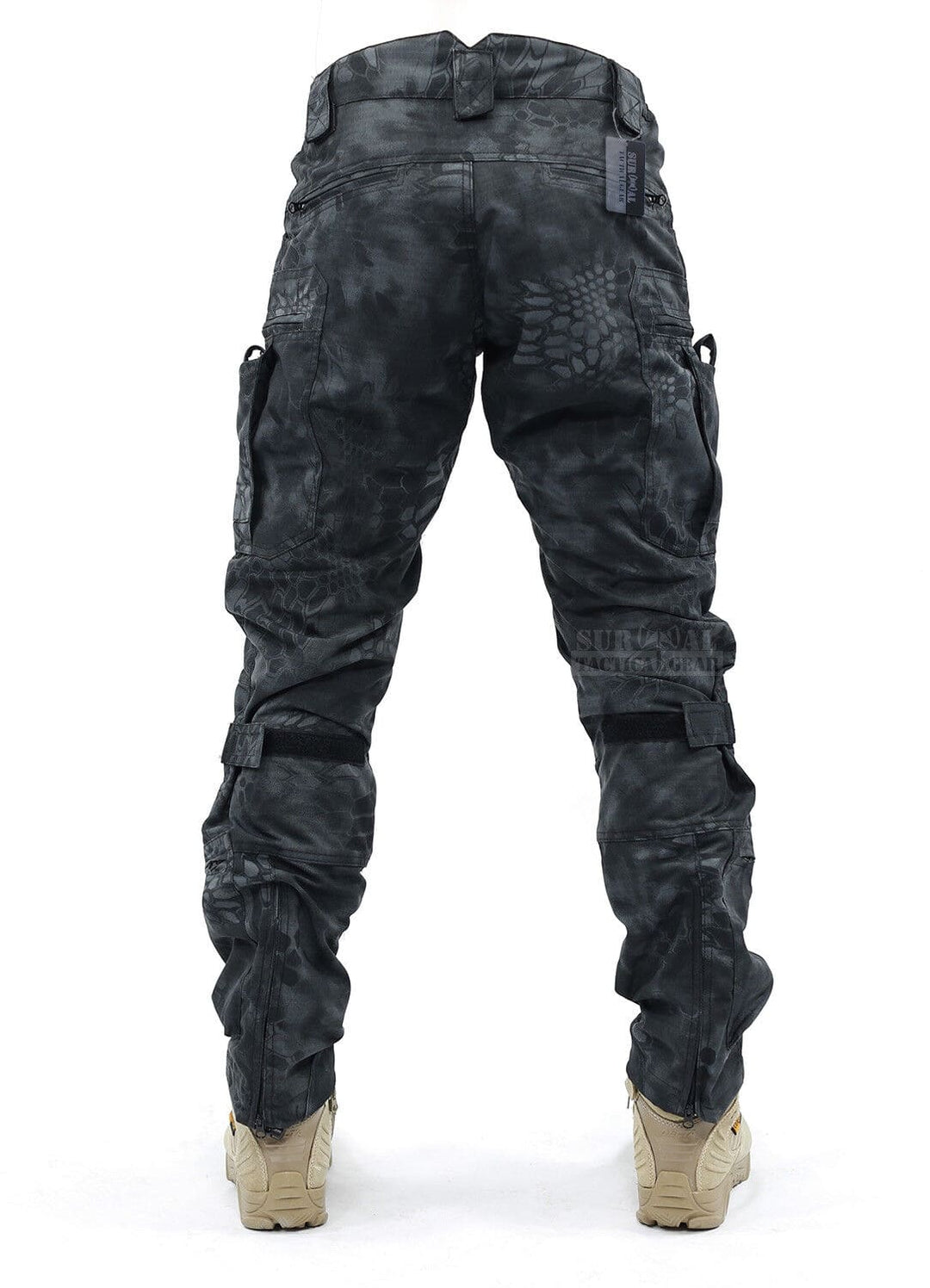 Men's durable adventure pants, featuring integrated knee pads & a robust design for challenging terrain.