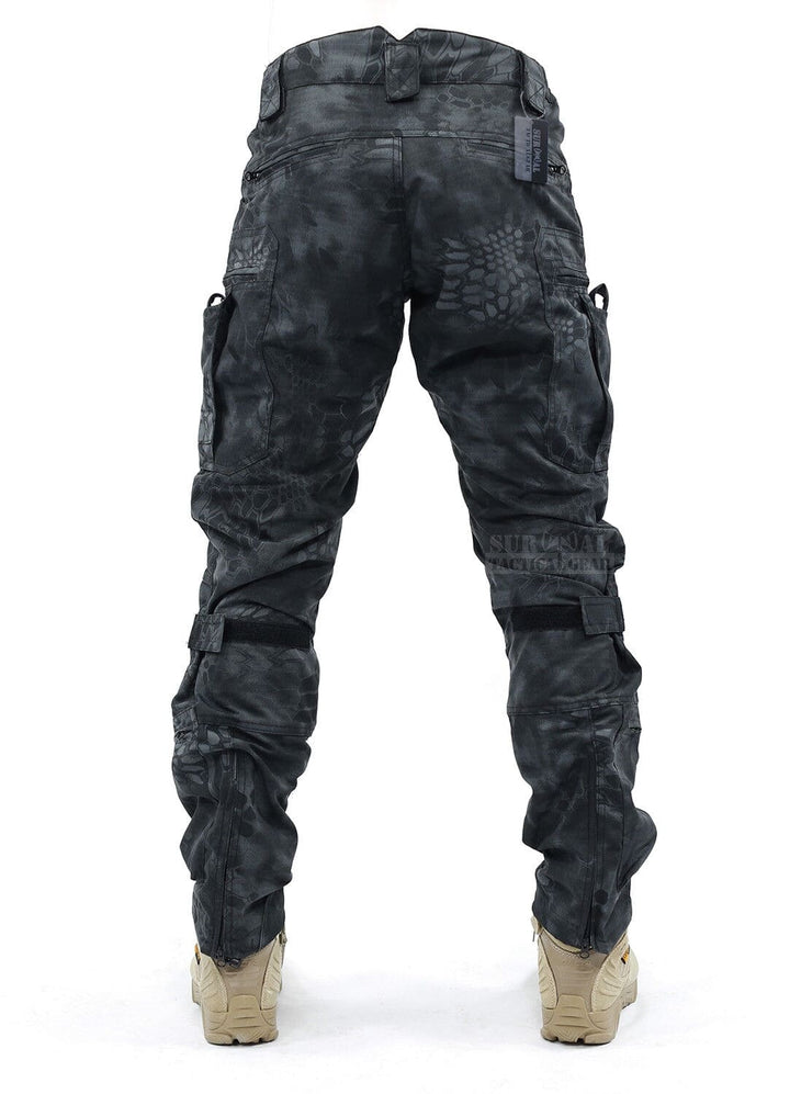 Men's durable adventure pants, featuring integrated knee pads & a robust design for challenging terrain.