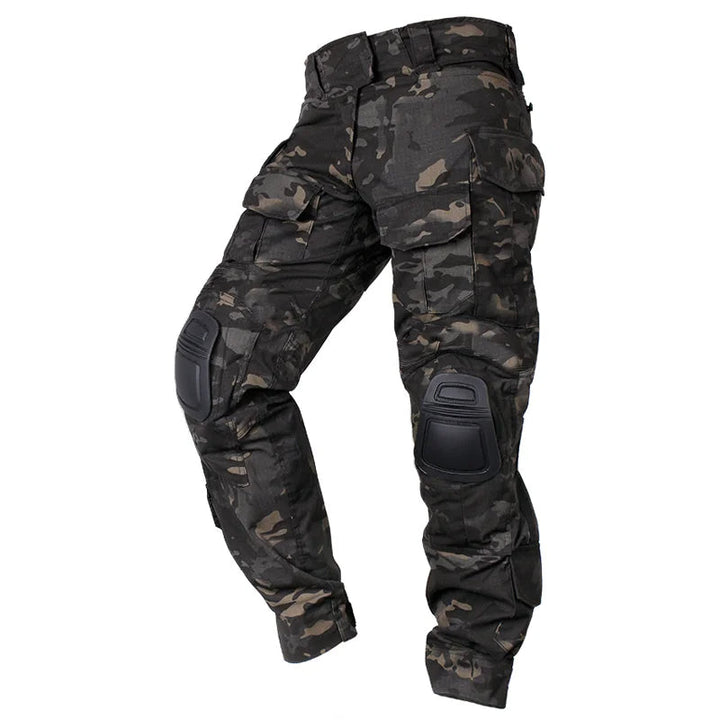 Side profile of men's utility pants, showcasing large cargo pockets & reinforced knee pads for hiking.