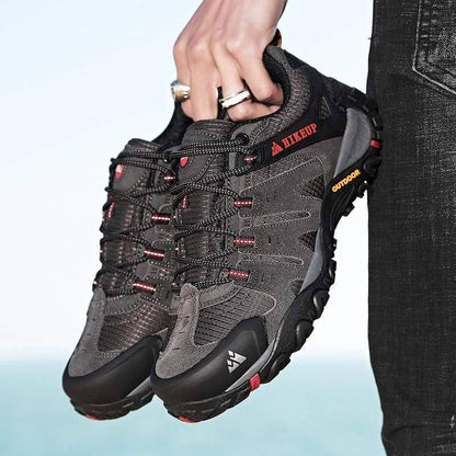 Close-up of men's athletic tactical sneakers with suede leather and sturdy sole for trekking