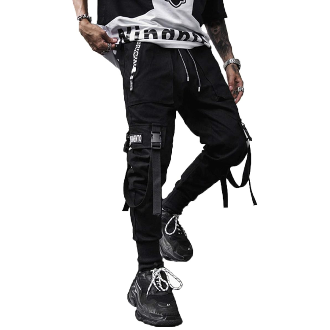 Stylish black techwear joggers for men, featuring a harem fit and functional multi-pocket design.