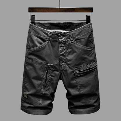 Modern men's tailored cargo shorts, ideal for versatile summer fashion. Offering comfort and utility pockets.