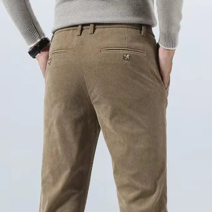 Wrinkle-resistant gray tailored dress pants for men, offering smart casual appeal and comfort.