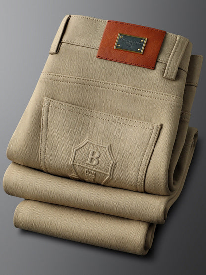 Premium men's herringbone tailored trousers, offering sharp style for formal occasions.