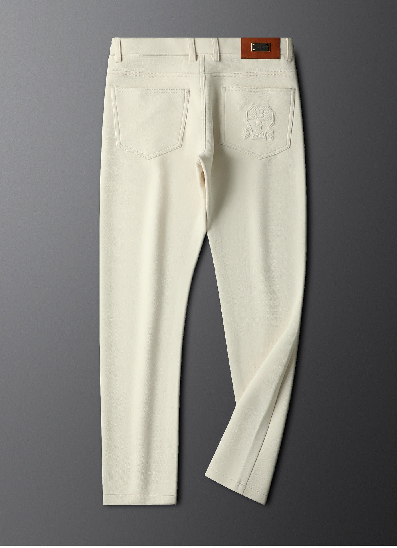 Modern men's tailored dress trousers, essential for sharp office wear and elegant formal attire.